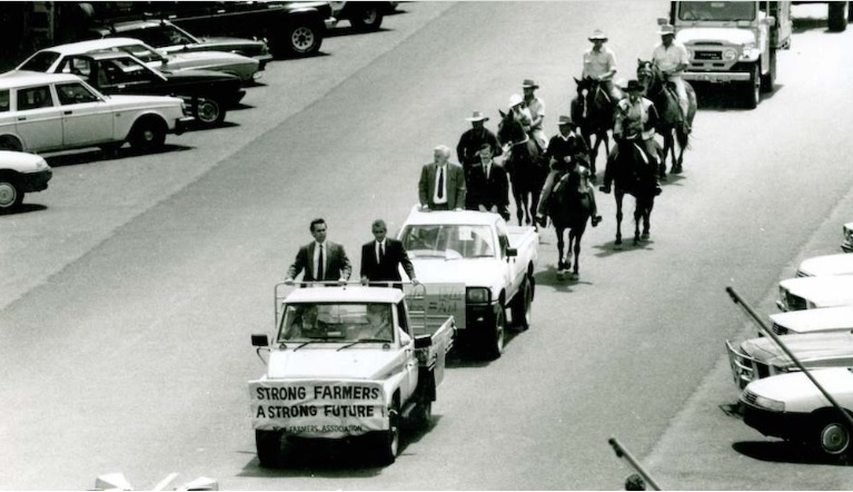 Black and white photo of parade