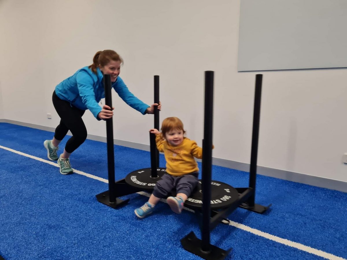 Kate and daughter exercising