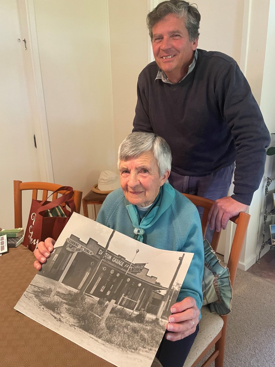 Man and woman holding photo