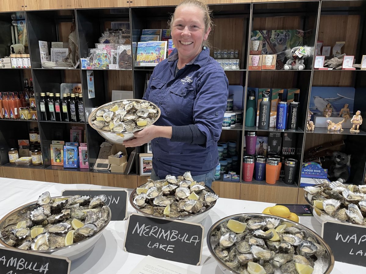 Sue McIntyre of Broadwater Oysters with bowls of oysters