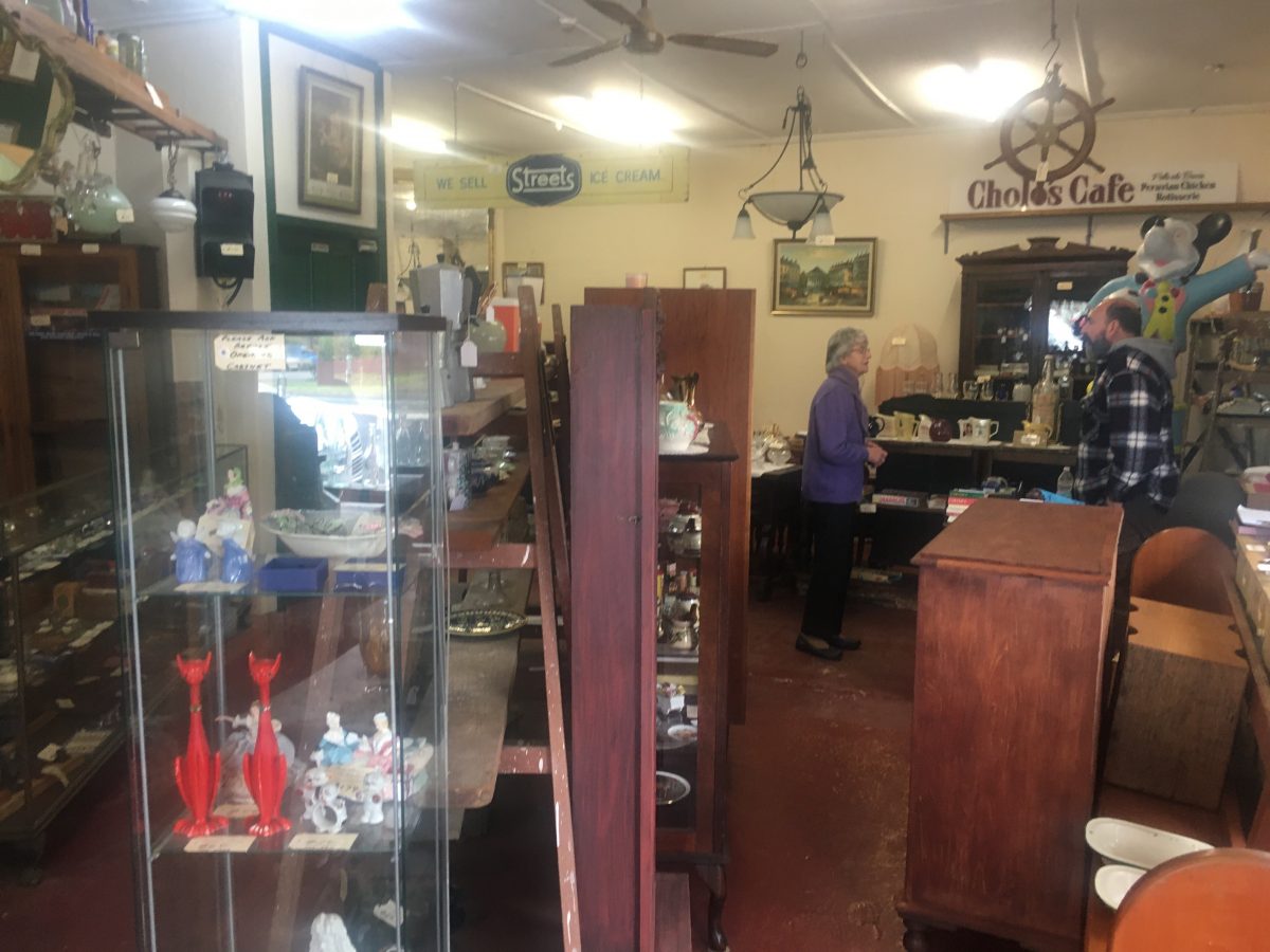 Man and woman in collectables shop