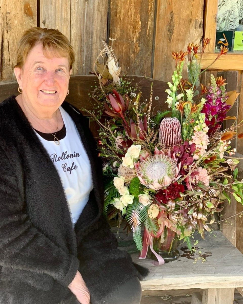 Woman with bunch of flowers