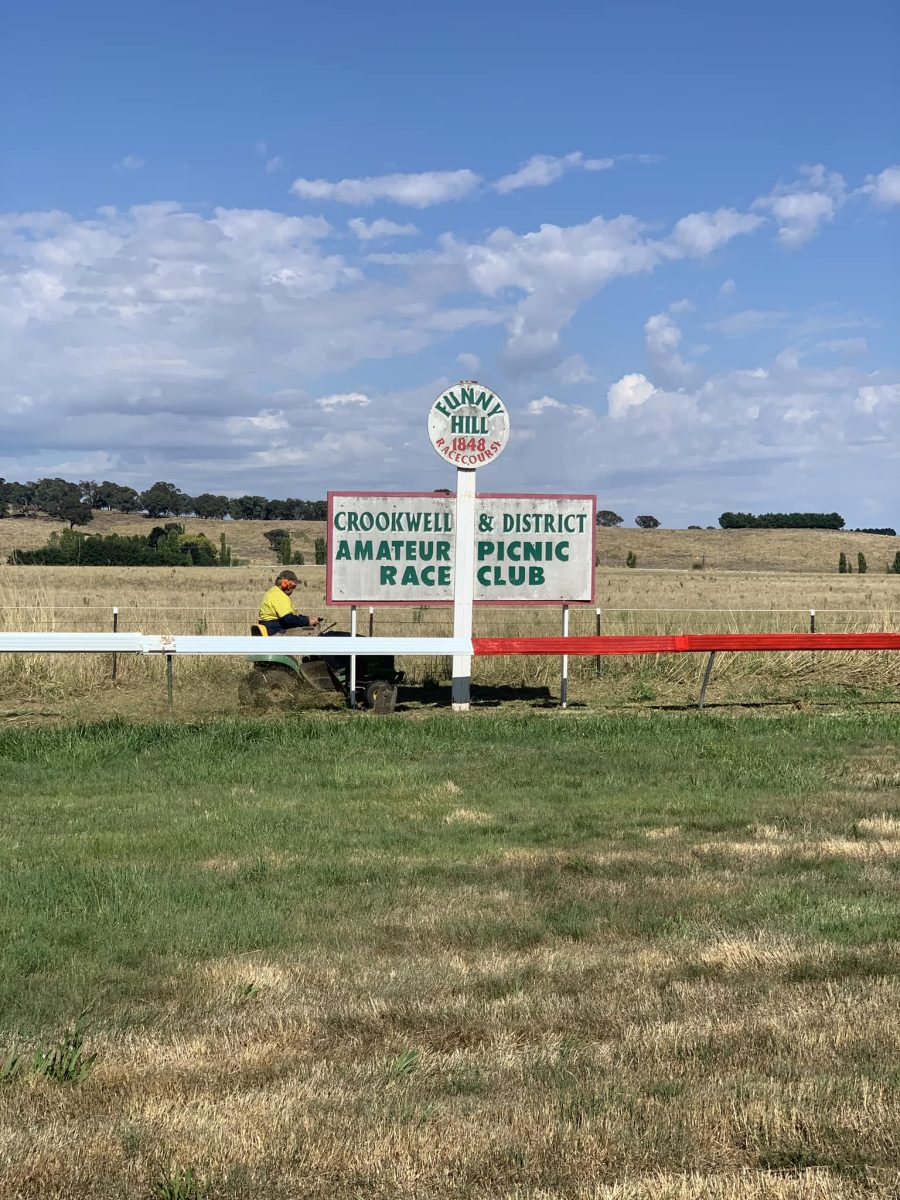 Race club sign on paddock racetrack