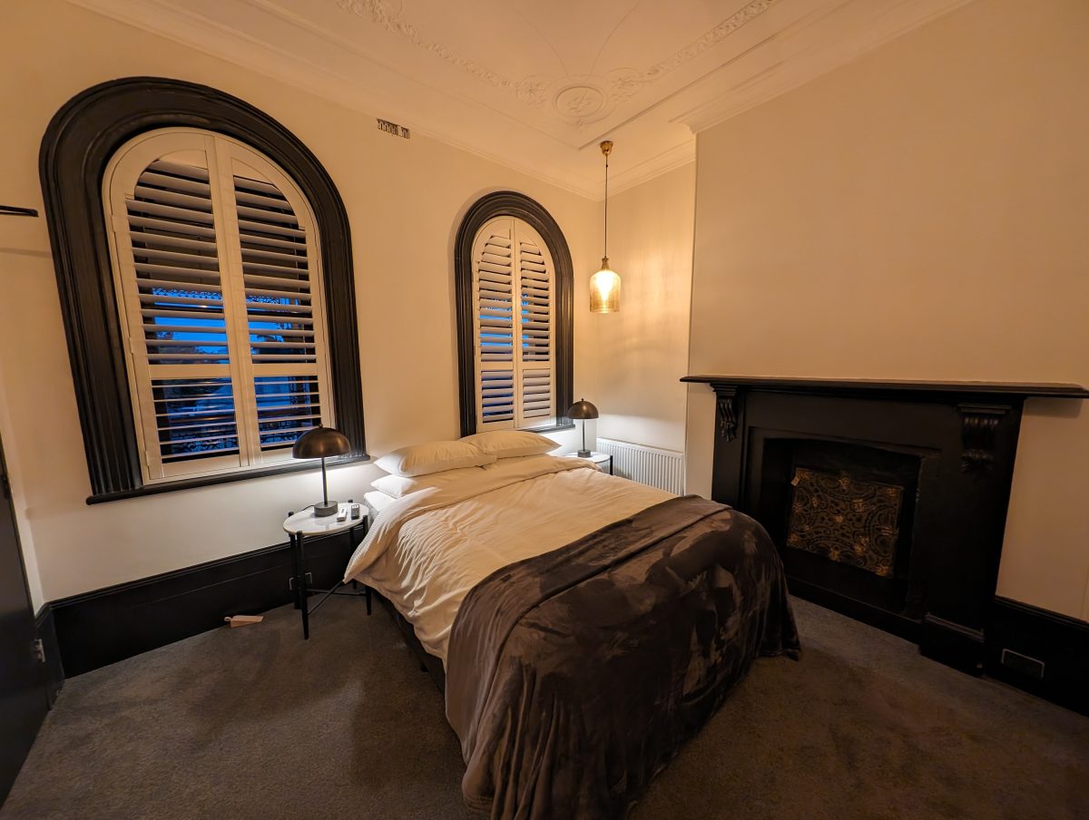 Interior of hotel room with fireplace