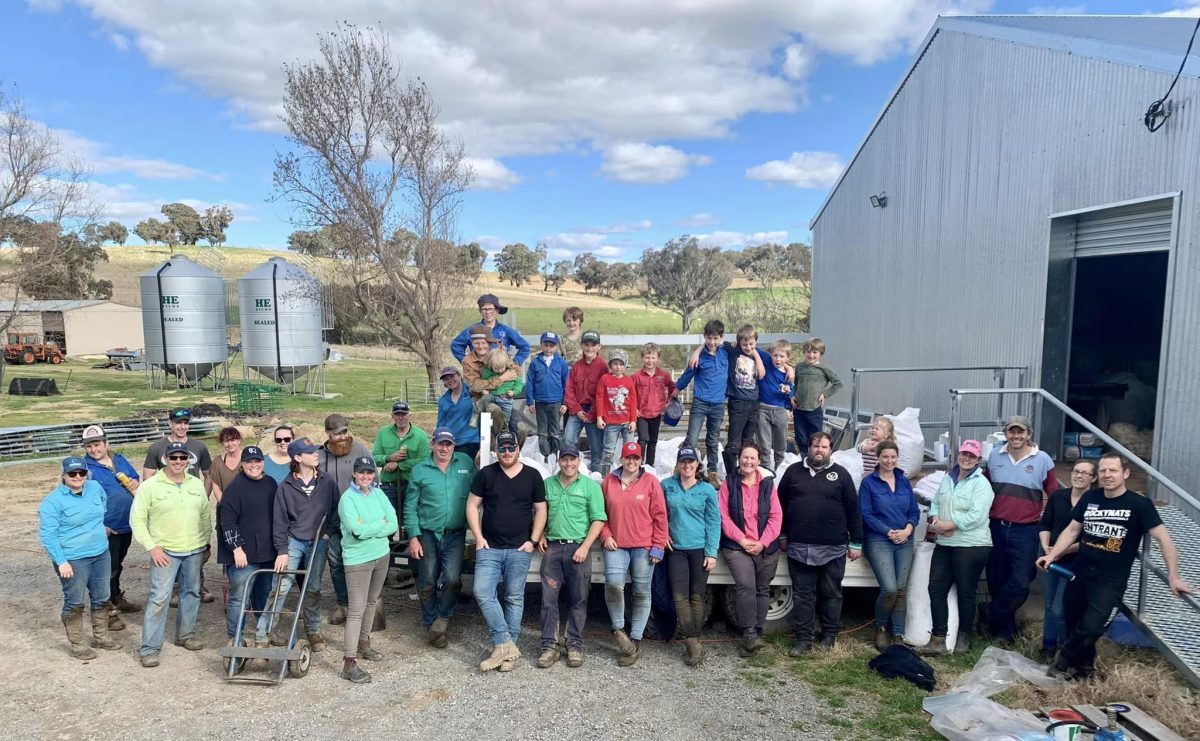 Group of people outside shearing shed