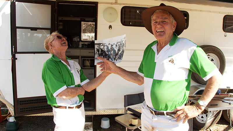 Tiger Hunter (right) shares a yarn or two with Kevin Bradford at a 40th anniversary masters event at Hall.