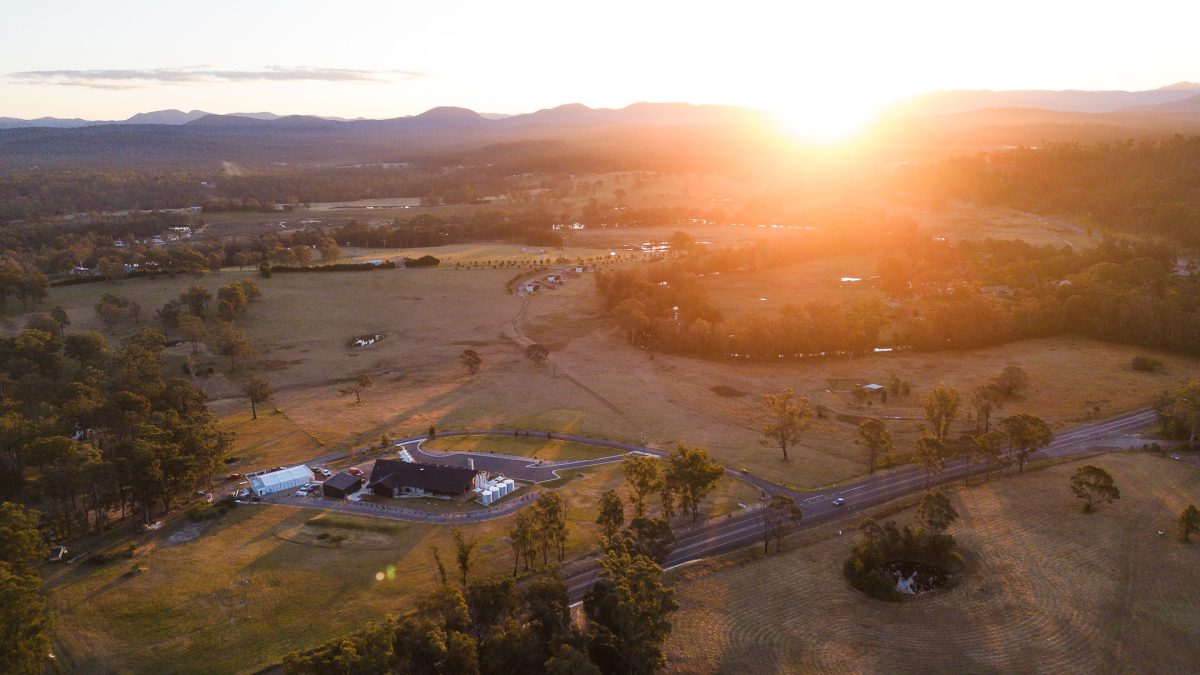 Drone shot of a distillery and surrounding land