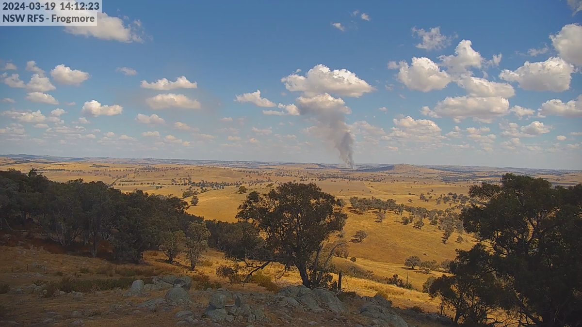 smoke billowing from distant bushfire