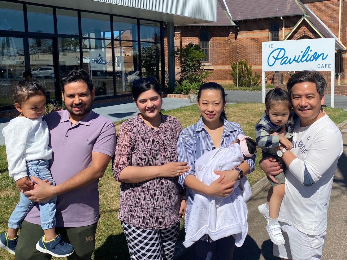 Raj Acharya and his two-year-old son Aahansh, Raj’s wife Sabita, Sunita Gurung nursing Aarshvi, Raj and Sabita’s one-month-old daughter and Rajan Gurung and his two-year-old son Rhys, outside the Pavilion cafe in Clifford Street Goulburn. The owners Lush Lush Cafe have bought the Pavilion and will open on 9 December under the Bluebird Cafe and Bar. 