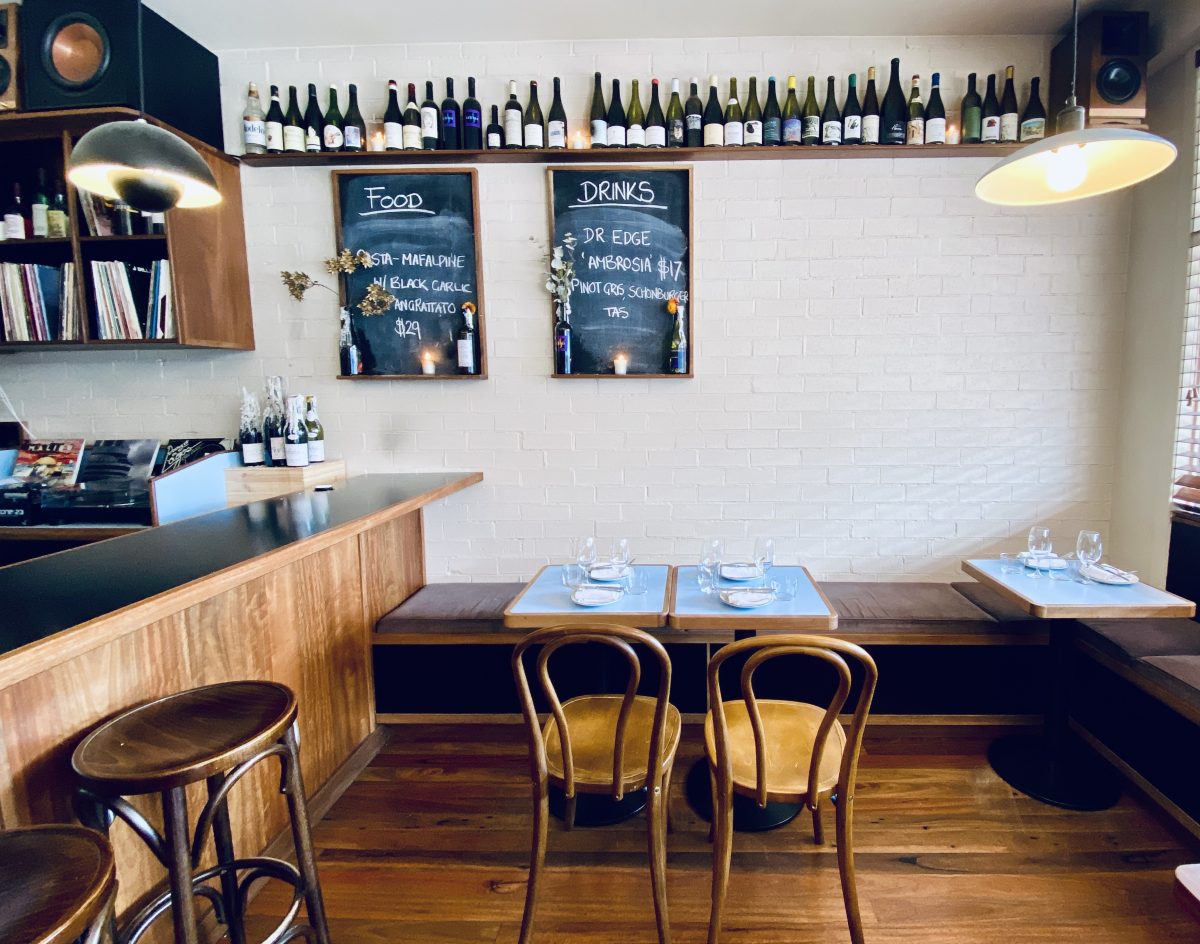 Interior of bar with blackboard specials and a record player