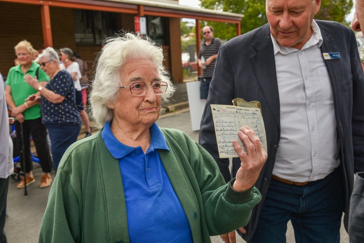 A woman holds bank passbook