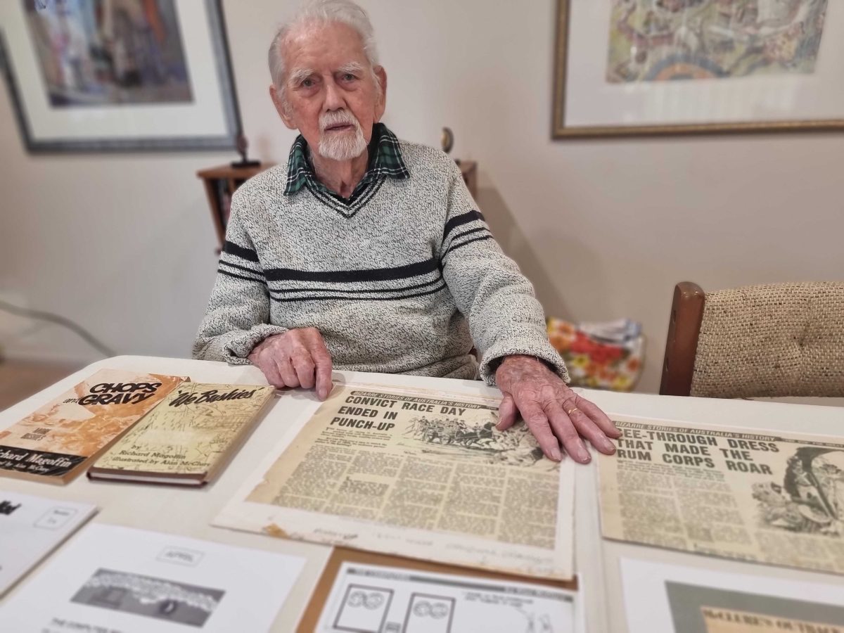 cartoonist with examples of his published work