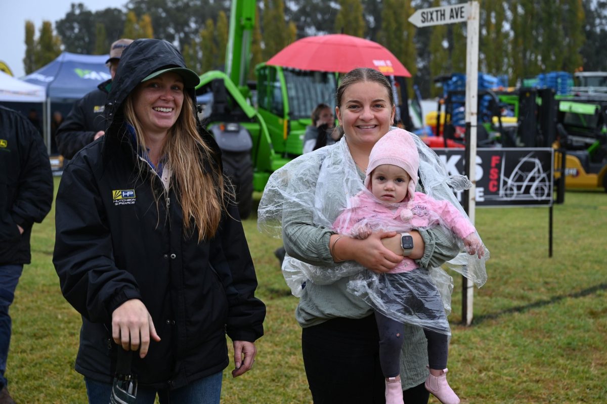 Mum and baby in rain