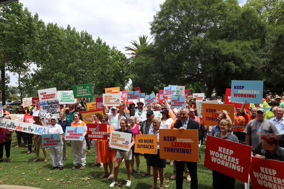 Protest rally holding placards